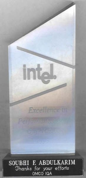 Intel Excellence in Performance and Quality crystal award presented to Soubhi F. Abdulkarim by OMCO IQA